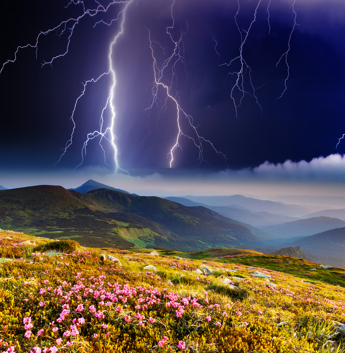 Thunderstorm with lightning in mountain landscape. Dramatic sky. Carpathian, Ukraine.
